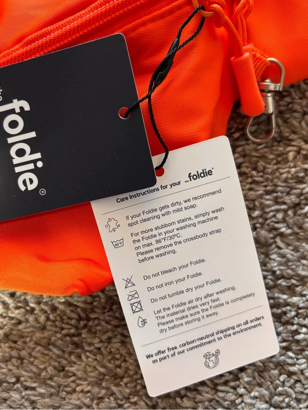 NWT The Foldie Orange Crossbody Bag/Fanny Pack/Travel Bag RFID safe wallet